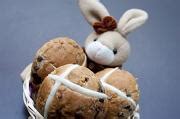 Free Image of Easter bunny with a basket of Hot Cross Buns | Freebie.Photography