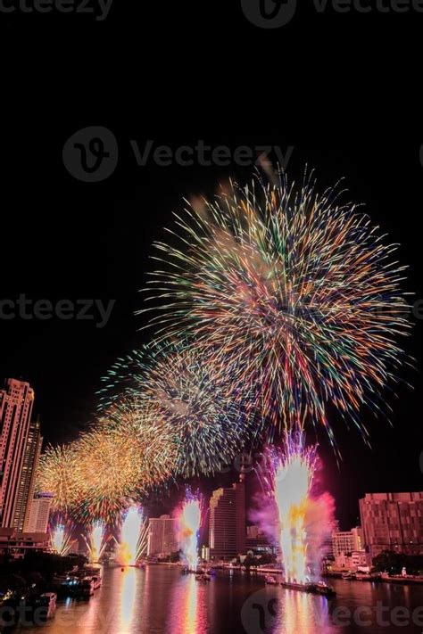 fireworks on the river at night 16705122 Stock Photo at Vecteezy