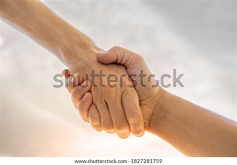 Hand Reaching Out Help Support Another Stock Photo 1827281759 | Shutterstock