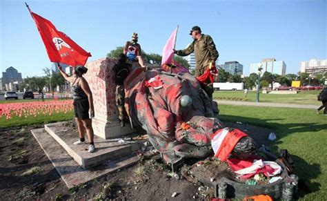 Statues Of Queen Elizabeth II And Queen Victoria Knocked Down Amid Anger Over Indigenous ...