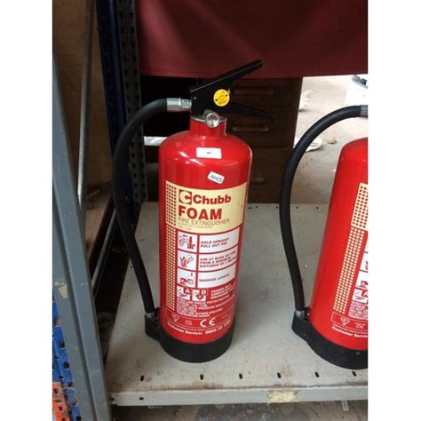 A CHUBB, FULL, 2KG CARBON DIOXIDE FIRE EXTINGUISHER AND TWO CHUBB 6 ...