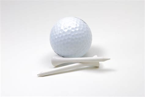 Golf Ball and Tees on White Background | White golf ball and… | Flickr