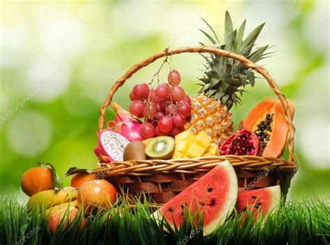 Basket of fresh tropical fruits on green grass and on nature bac - Stock , #spon, #tropical, # ...