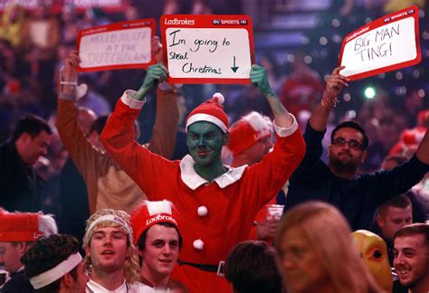 In pictures: Darts fans outdo themselves with magnificent fancy dress ...