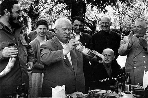 Fidel Castro and Nikita Khrushchev drinking wine from a drinking horn ...