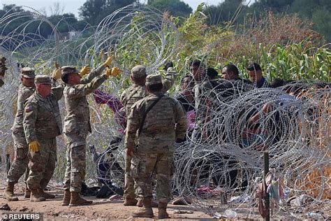 Eagle Pass border standoff: Texas National Guard stare into the eyes of ...