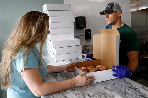 New donutshop on lets customers watch workers make their treats