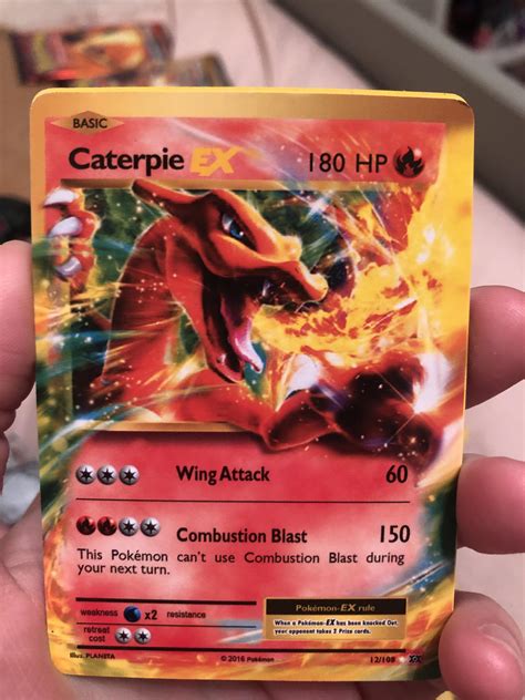 this bootleg pokémon card calls charizard caterpie : r/mildlyinteresting