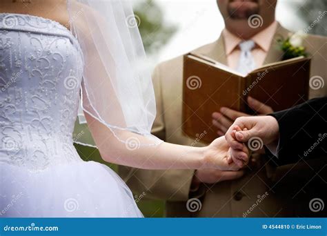 Holding Hands During A Wedding Ceremony Stock Photo - Image: 4544810