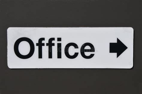 Office Sign with Directional Arrow Stock Photo - Image of sign, company ...