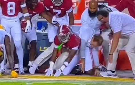 Nick Saban Ends Up falling On Back of Player During LSU Game