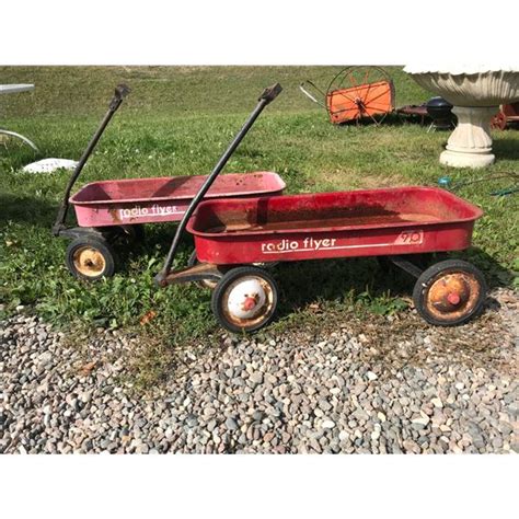 PAIR OF VINTAGE METAL RED WAGONS