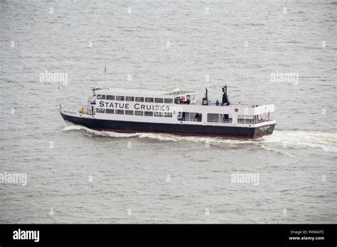 Statue Cruises passenger ferry taking tourists to the Statue of Liberty from Battery Park ,New ...