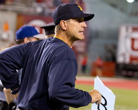 Jim Harbaugh tweets explanation for outdated roster