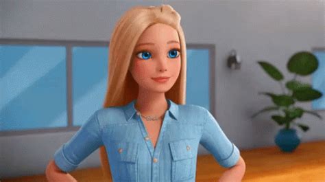 a barbie doll with blonde hair and blue eyes standing in front of a wooden table