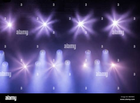 Purple stage lights at music festival Stock Photo - Alamy