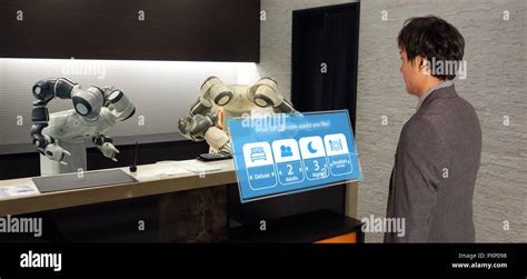 smart hotel in hospitality industry 4.0 concept, the receptionist robot ...