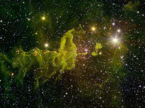 New Spitzer Image: A Space Spider Watches Over Young Stars