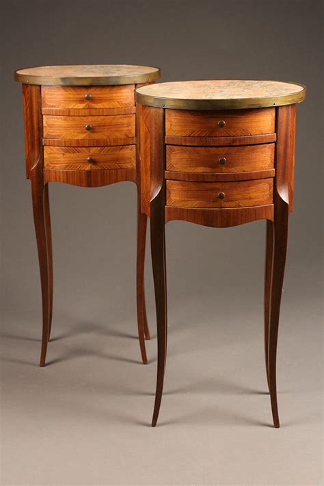 Pair of 19th century antique oval marble top nightstands.