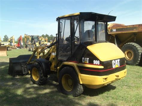 CAT 906 WHEEL LOADER - J.M. Wood Auction Company, Inc.