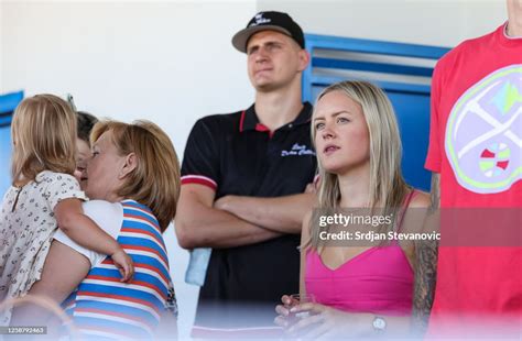 Nikola Jokic of Denver Nuggets and his wife Natalija Jokic watch a ...