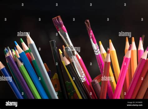 A set of colored pencils, stationery. Lots of colorful pencils on the table. Drawing and Visual ...