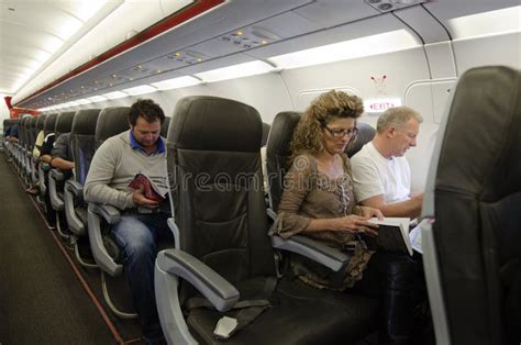 Interior of Airplane with Passengers Editorial Photography - Image of ...