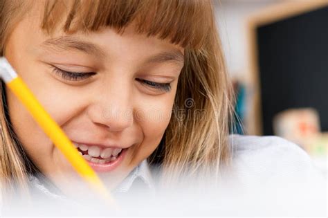 Happy girl in school stock image. Image of exam, home - 75185381