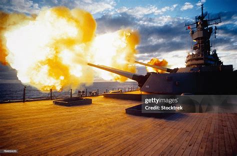 Battleship Firing Guns High-Res Stock Photo - Getty Images