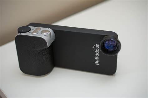 The Snappgrip is probably closest you'll get to actually turning an iPhone 5/5S into a point-and ...