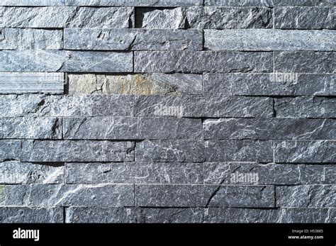 dh Brick wall STONE TEXTURE Grey stone texture background gray close up Stock Photo - Alamy