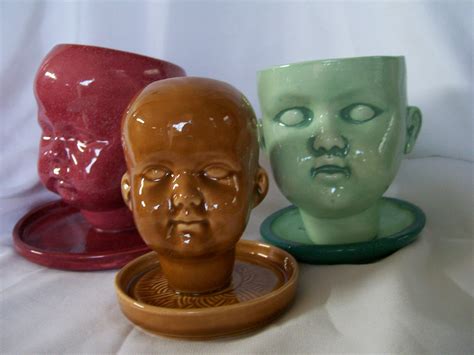 More Baby Doll Head Planters | Cement crafts, Doll head, Doll therapy