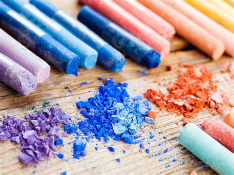 Rainbow colored pastel crayons with crushed chalk close up 937668 Stock Photo at Vecteezy