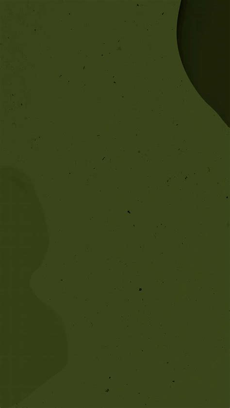 Download A Green Puddle With A Black Splatter Wallpaper | Wallpapers.com