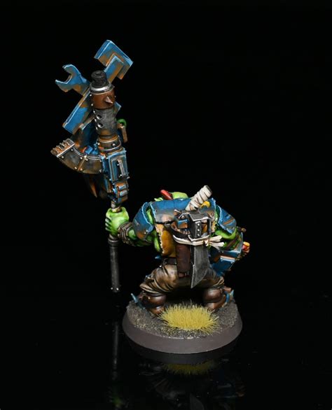 Ork Nob With Waaagh! Banner. Credit: Rockfish – Goonhammer