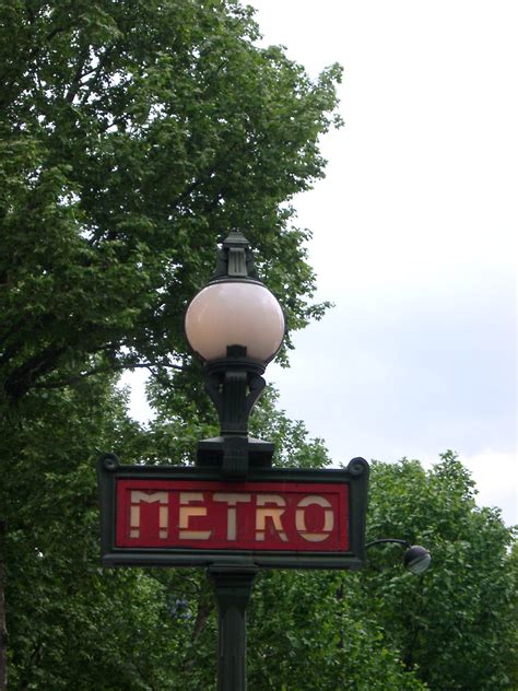 Free Stock photo of Paris Metro Sign and Lamp Post | Photoeverywhere