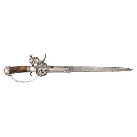 Attractive and Unusual Composite Silver-Mounted German Flintlock Sword Pistol - auctions & price ...