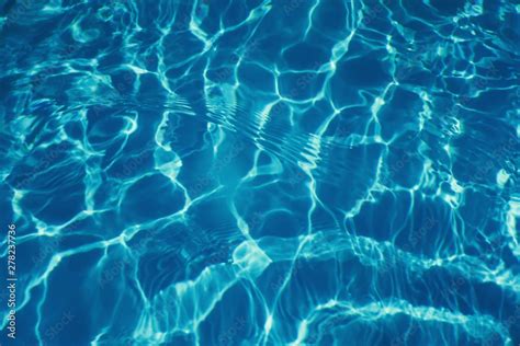 Swimming pool water sun reflection background. Ripple Water. Stock Photo | Adobe Stock