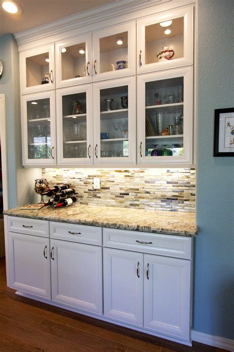 KraftMaid Judson door style in Dove White with granite countertops and glass tile. | Dining room ...