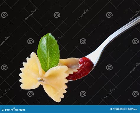 Farfalle Pasta with Tomato Sauce and Basil Stock Image - Image of italy, bite: 126288843