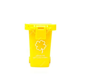 Premium Photo | Large yellow trash can with wheel isolated on white background