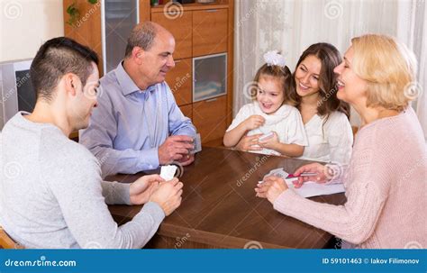 Family playing cards stock image. Image of happy, keeping - 59101463