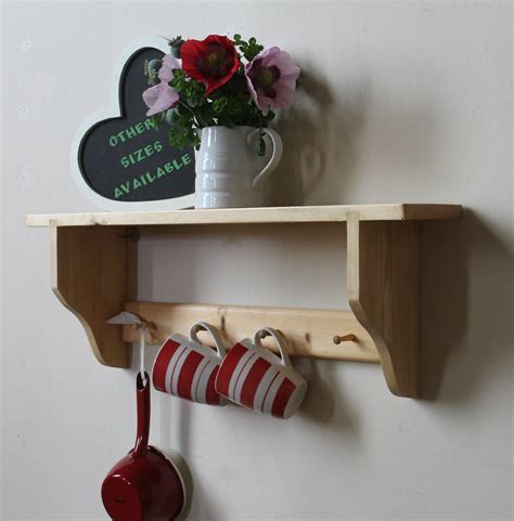 SHAKER 1 shelf with small pegs | Wall shelves, Shelves, Wooden pegs