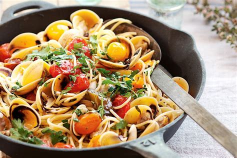 Spaghetti cooked risotto-style with vongole and roasted cherry tomatoes - Recipes - delicious.com.au