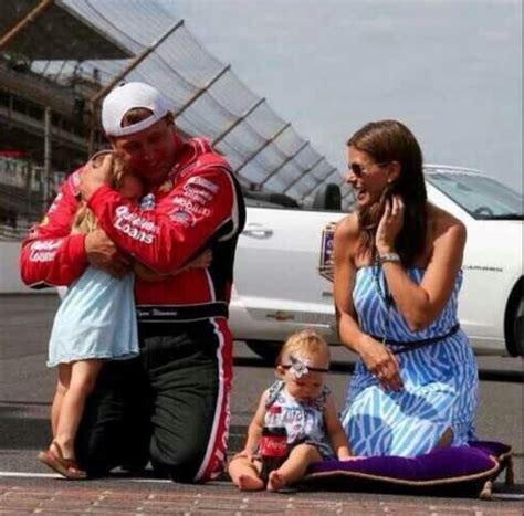 PHOTO Ryan Newman On The Track With His Wife Hugging His Daughter