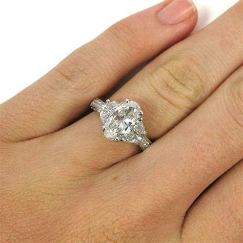 GIA Certified 2.55 Carat Total Oval and Half Moon Pave Diamond Platinum Ring at 1stdibs