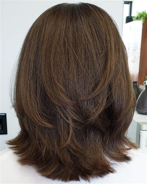 50 Medium Haircuts for Women That’ll Be Huge in 2024 - Hair Adviser ...