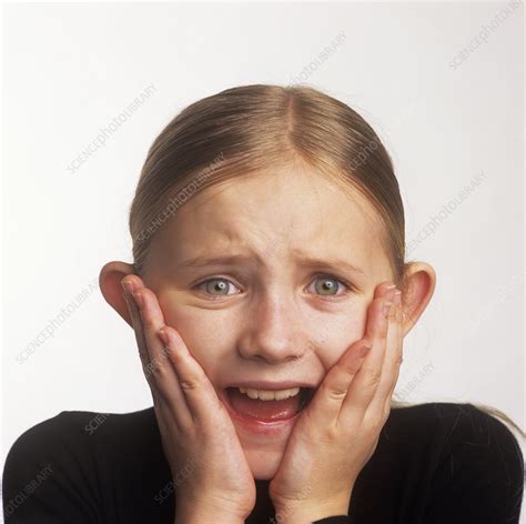 Scared girl - Stock Image - P701/0371 - Science Photo Library