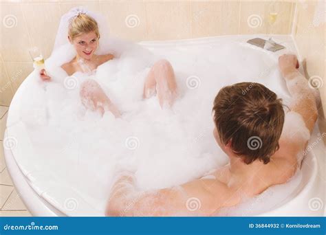 Wedding Couple is Enjoying a Bath with Bubbles Stock Photo - Image of ...