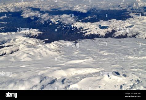 Top view of mountain peaks in the snow Stock Photo - Alamy